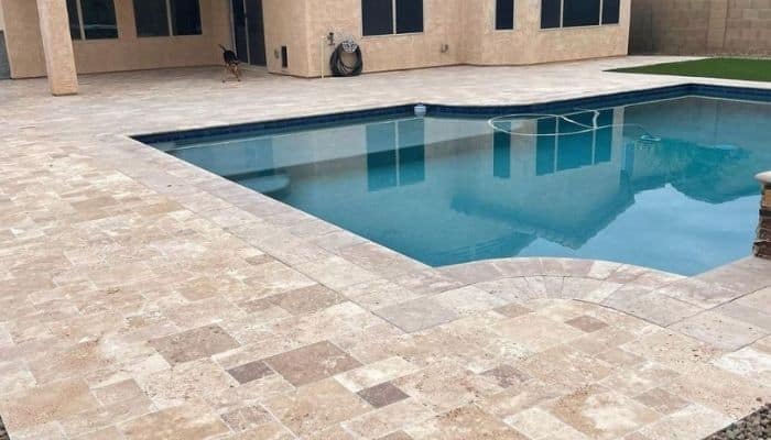 Poolside with travertine in arizona