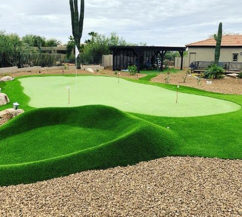 putting green in desert backyard