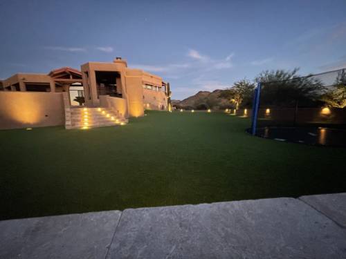 evening-time-landscape-lighting-in-artificial-turf-paradise