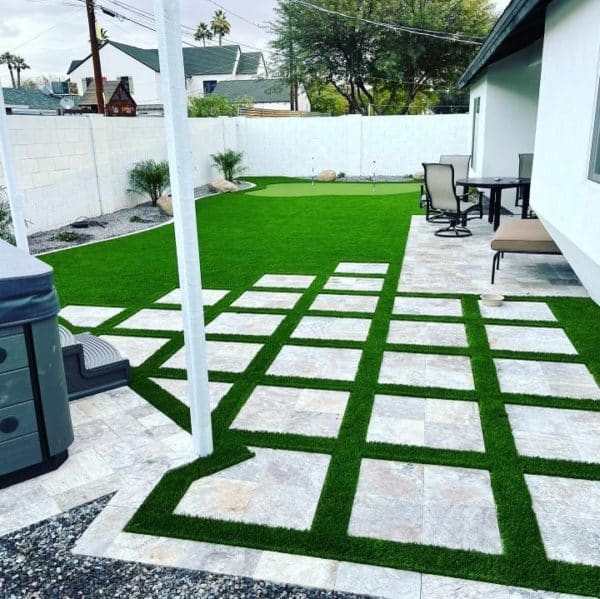Backyard Patio Pavers with Fake Grass Surrounding