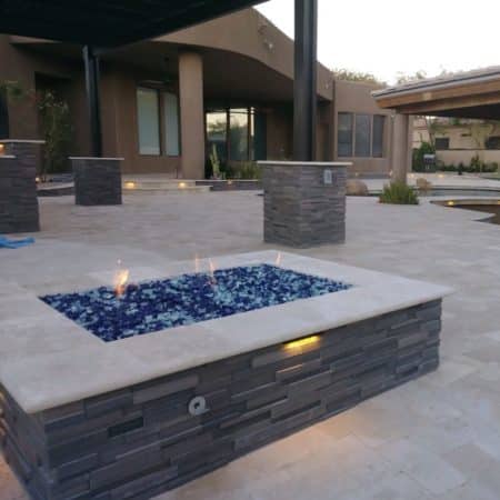 Custom Made Backyard Gas Firepit with Blue Rocks