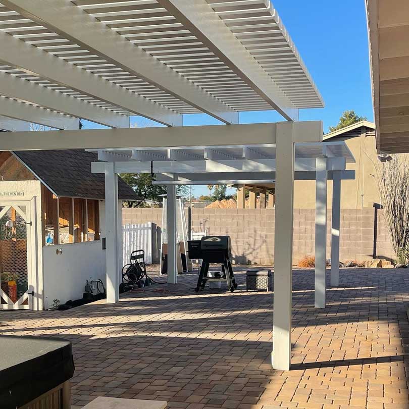 Carefree, Arizona White Pergola Installation in Yard Over Patio