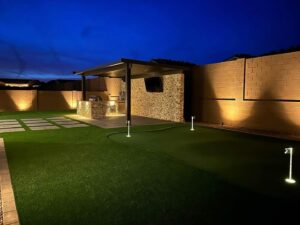 Backyard with Faux Grass and Custom Lights