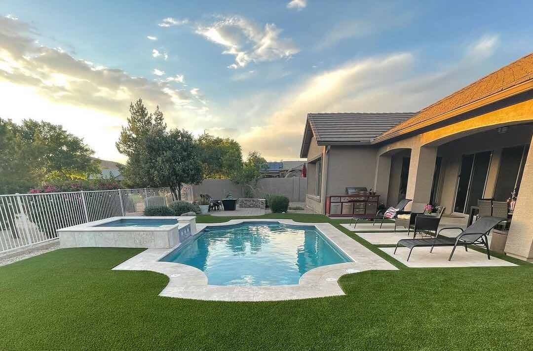 backyard pool and turf