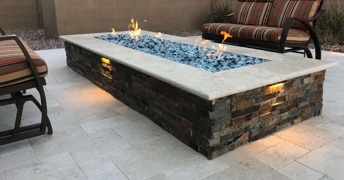 Large Rectangular Backyard Fire Pit with White Stone & Grey Stacked Rock Wall