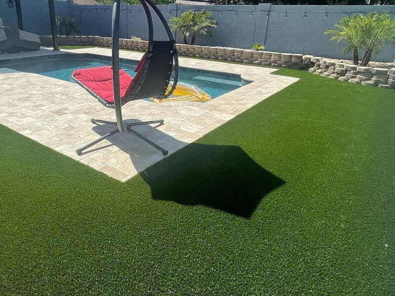 Backyard in Arizona with Fake Grass Installed Around Pool